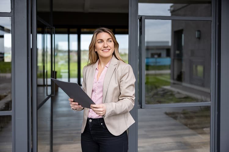 Property manager outside building