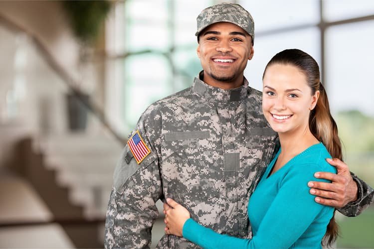 Woman with a man in military camouflage